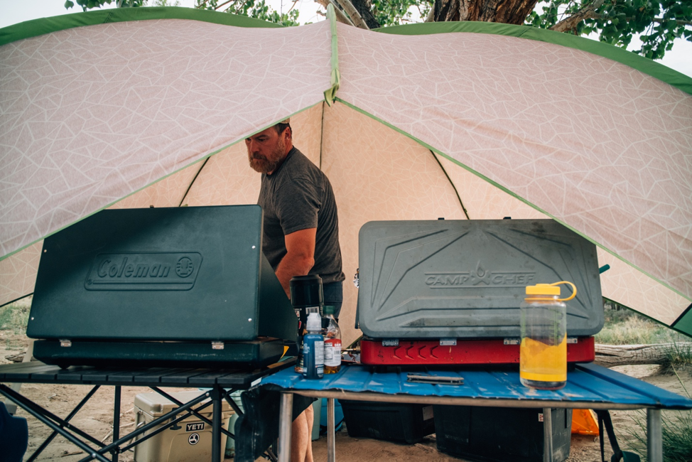 A picture containing tent, camp cooking, stoves